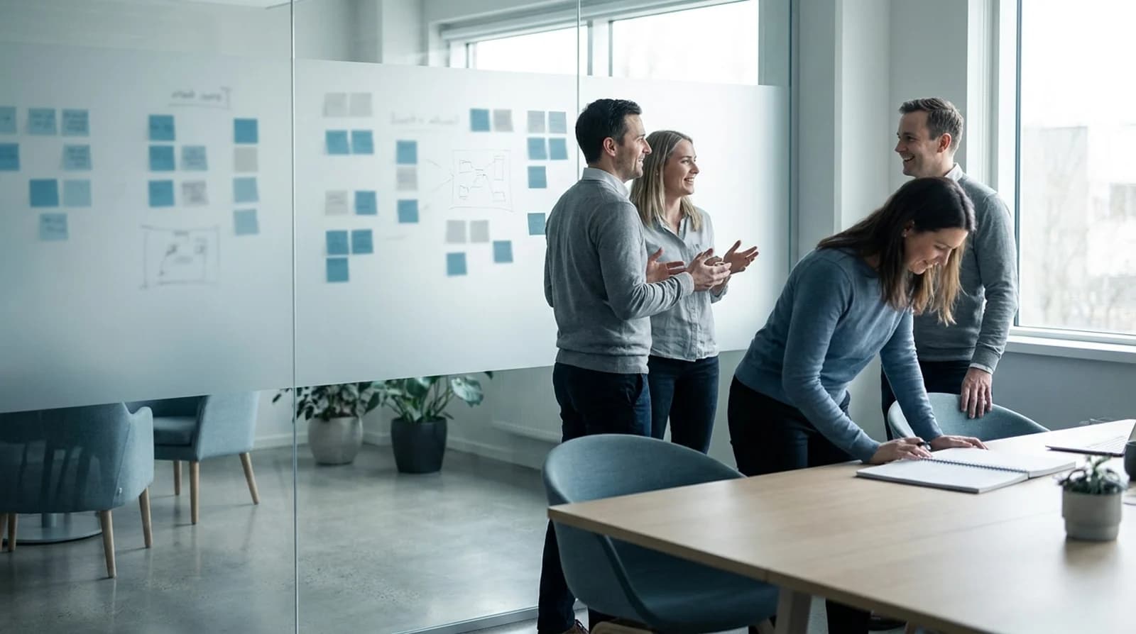 The team collaborating in a bright modern office